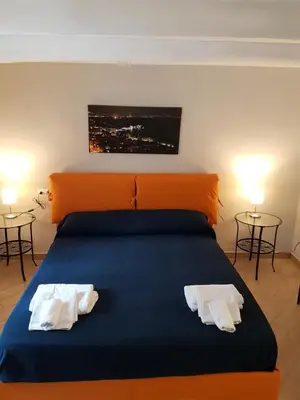 Letto o letti in una camera di La casa di Abbi