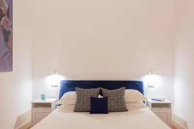 Letto o letti in una camera di Eleonora Suites