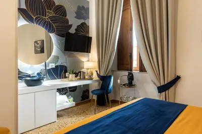 Letto o letti in una camera di La Lepre felice-bovio