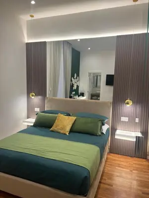 Letto o letti in una camera di La Lepre felice-bovio