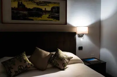 Letto o letti in una camera di Seaside Caracciolo