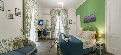 Letto o letti in una camera di La Terrazza ai Miracoli