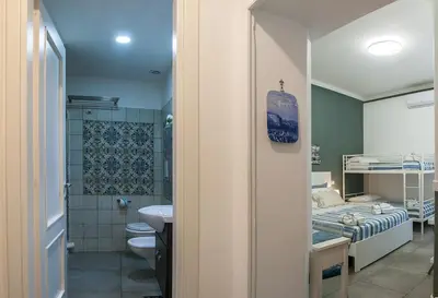 Letto o letti in una camera di La Terrazza ai Miracoli