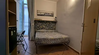Letto o letti in una camera di B&B Napoli Plebiscito