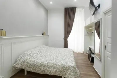 Letto o letti in una camera di Vomero House