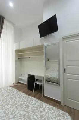 Letto o letti in una camera di Vomero House