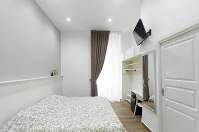 Letto o letti in una camera di Vomero House