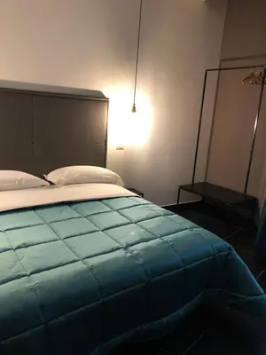 Letto o letti in una camera di Pit Stop Napoli Centrale