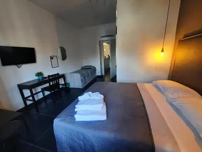 Letto o letti in una camera di Pit Stop Napoli Centrale