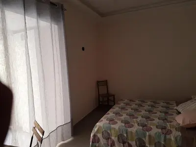 Letto o letti in una camera di Street House