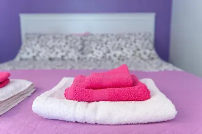 Letto o letti in una camera di FV STUDIOS Chiaia