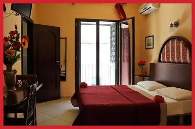 Letto o letti in una camera di B&B La Storia Di Napoli