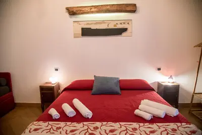 Letto o letti in una camera di Guest Art Napoli