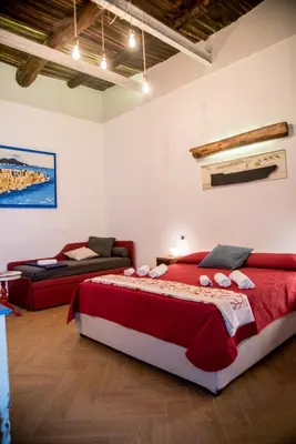 Letto o letti in una camera di Guest Art Napoli