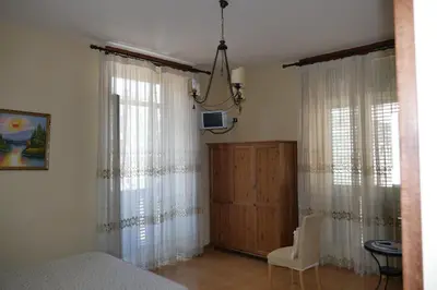 Letto o letti in una camera di B&B Domus Gemi