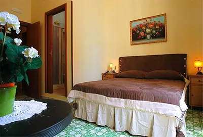 Letto o letti in una camera di B&B Domus Gemi