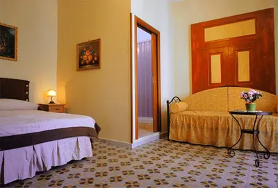 Letto o letti in una camera di B&B Domus Gemi