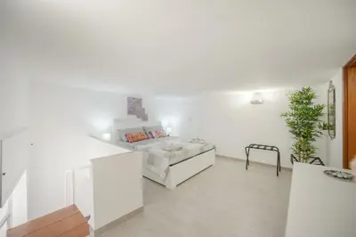 Letto o letti in una camera di MIRANDA APARTMENTS nel cuore del Vomero