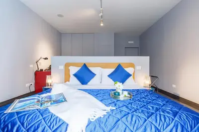 Letto o letti in una camera di Dimora Doria d'Angri