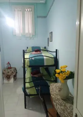 Letto o letti in una camera di B&B MIRAGLIA