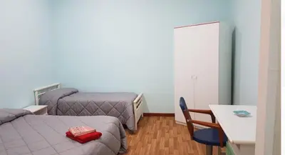 Letto o letti in una camera di B&B MIRAGLIA