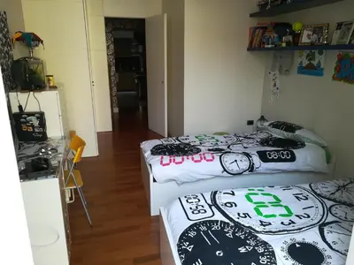 Letto o letti in una camera di Casa Mergellina