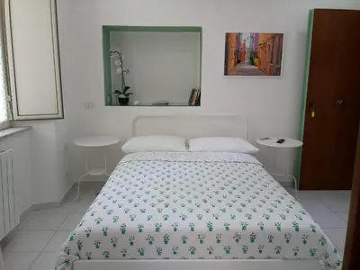 Letto o letti in una camera di Magic Napoli Green