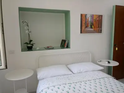 Letto o letti in una camera di Magic Napoli Green