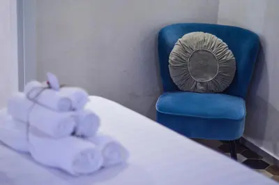 Letto o letti in una camera di Vicoli di Napoli B&B