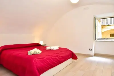 Letto o letti in una camera di Vecchia Napoli - Anticaglia