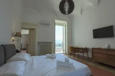 Letto o letti in una camera di Naples dream by Dimorra