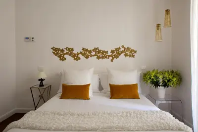 Letto o letti in una camera di Domus San Severo