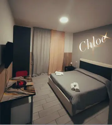 Letto o letti in una camera di Neapolis center