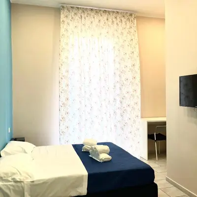 Letto o letti in una camera di Vesuvius Terminal
