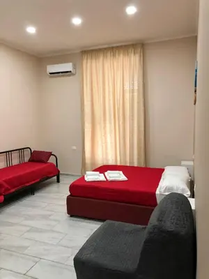 Letto o letti in una camera di Vesuvius Terminal