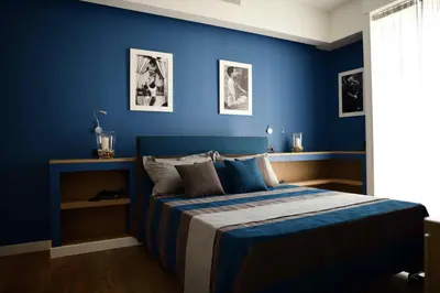 Letto o letti in una camera di 50 SUITE Guesthouse