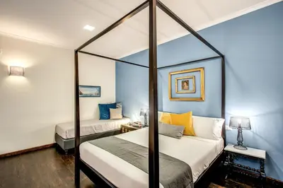 Letto o letti in una camera di Casa Hosteno