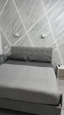 Letto o letti in una camera di B&B La casa di Cò