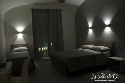 Letto o letti in una camera di B&B La casa di Cò