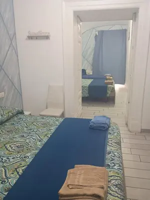 Letto o letti in una camera di B&B La casa di Cò