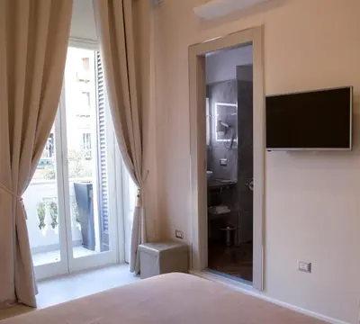 TV o dispositivi per l'intrattenimento presso Royal Rooms Luxury Suite