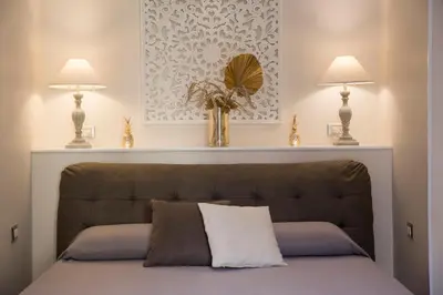 Letto o letti in una camera di Royal Rooms Luxury Suite