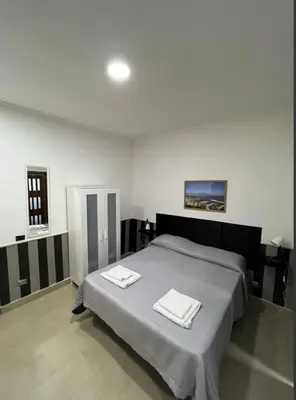 Letto o letti in una camera di Casa vacanza Da Totore