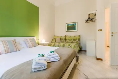 Letto o letti in una camera di La Casa Del Sole A Mergellina