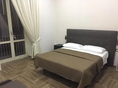 Letto o letti in una camera di B&B Da Maria