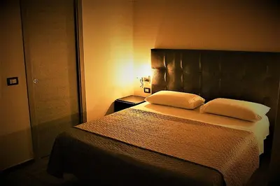 Letto o letti in una camera di B&B Da Maria