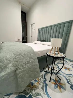 Letto o letti in una camera di B&B Da Maria