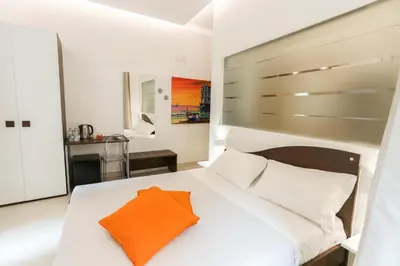 Letto o letti in una camera di Cortese