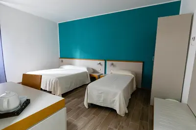 Letto o letti in una camera di Spira Mirabilis Napoli