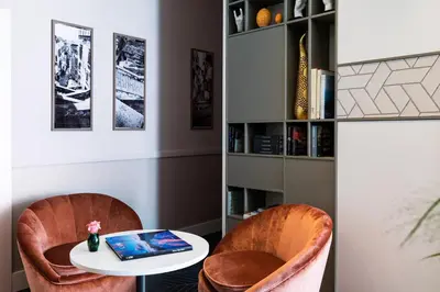 Area soggiorno di Amadomus Luxury Suites